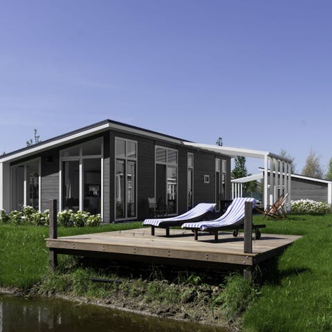 Pour your favourite drink then settle in at the water's edge for a lazy afternoon