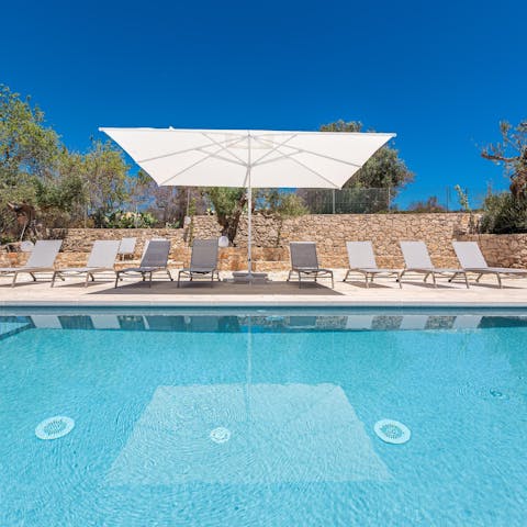 Slip into your swimwear and take a refreshing dip in the infinity pool