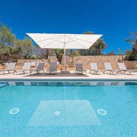 Slip into your swimwear and take a refreshing dip in the infinity pool