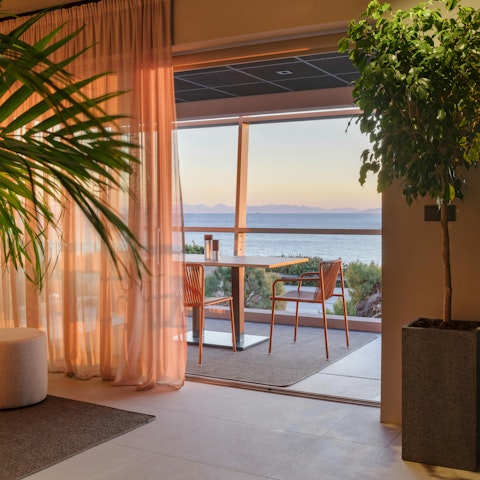 Dine alfresco on the terrace with sunset sea views