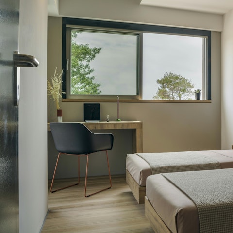Catch up on some work at the in-room desk