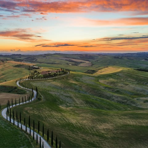 Explore the undulating Tuscan countryside