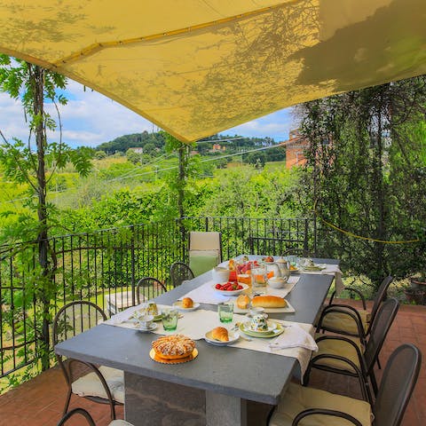 Enjoy your meals out on the covered terrace