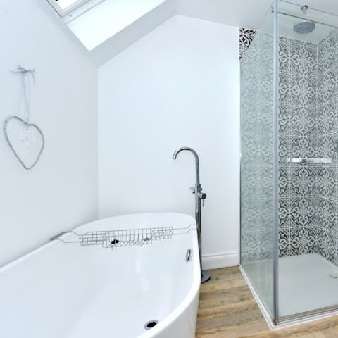 Sink back and relax in the freestanding bathtub positioned under the skylight
