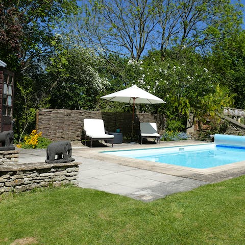 Sip bubbly on a nearby sun lounger or go for a dip in the heated pool