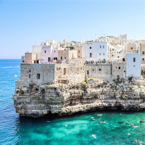 Discover picturesque Polignano a Mare – a thirty-minute drive away
