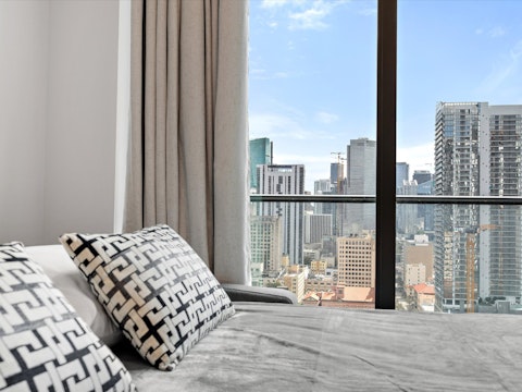 Wake to sweeping Downtown Miami skyline views from bed