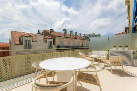 Relax on the private terrace with a glass of Champagne