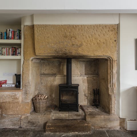 Light up the wood-burning stove in the huge stone fireplace