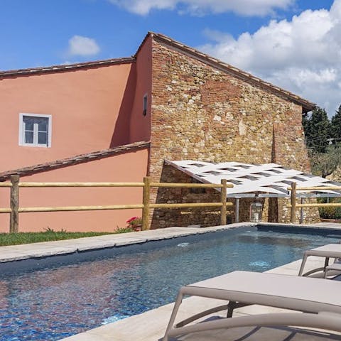 Soak up the sun beside the private pool