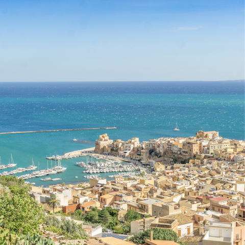 Explore the maritime town of Castellammare del Golfo – a six-minute drive away