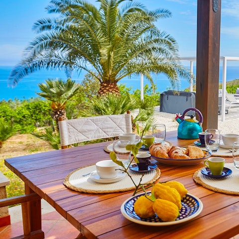 Start the day with an alfresco breakfast overlooking the sea