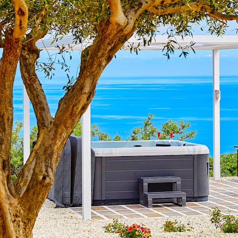 Savour the sea views as you relax in the private hot tub