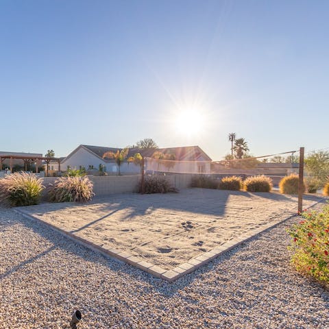 Set up a game of beach volleyball