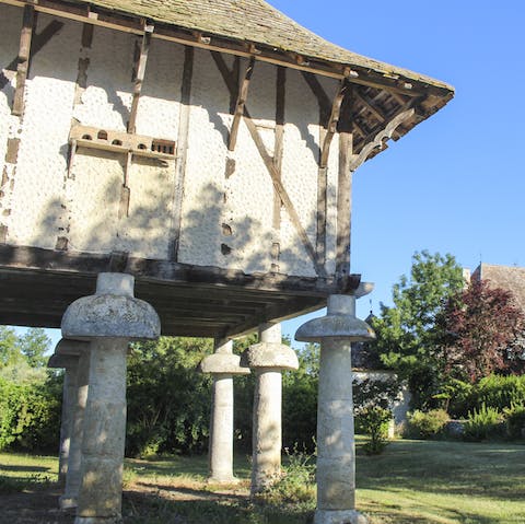 See doves flying from the pigeonnier