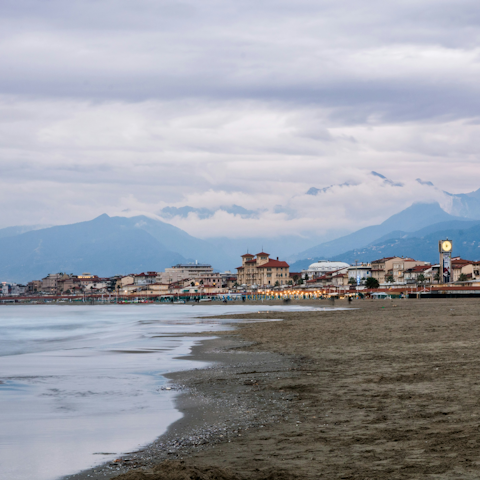 Drive fifteen minutes down the coast to the town of Viareggio