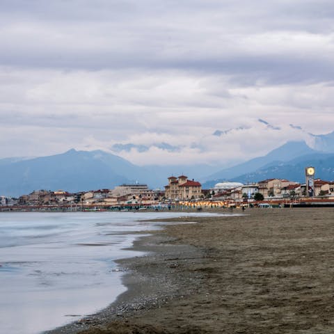 Drive fifteen minutes down the coast to the town of Viareggio