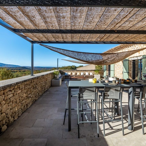 Enjoy alfresco meals with panoramic Luberon views