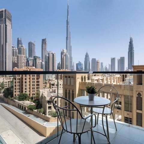 Take five on your private balcony and drink in the stunning skyline views
