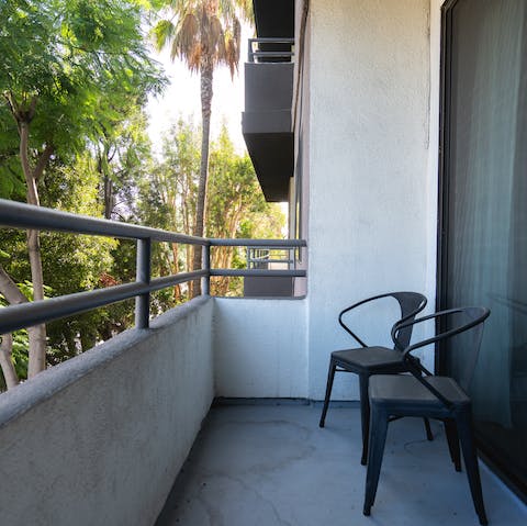 Enjoy a moment of peace out on the balcony