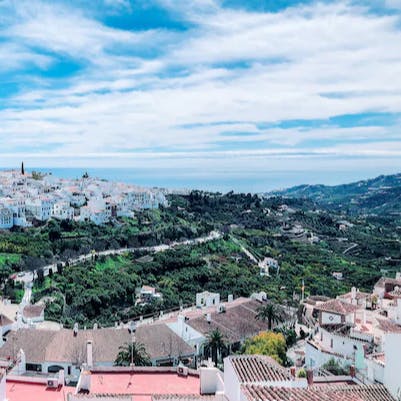 Wander the charming streets of Frigiliana with its picturesque white buildings