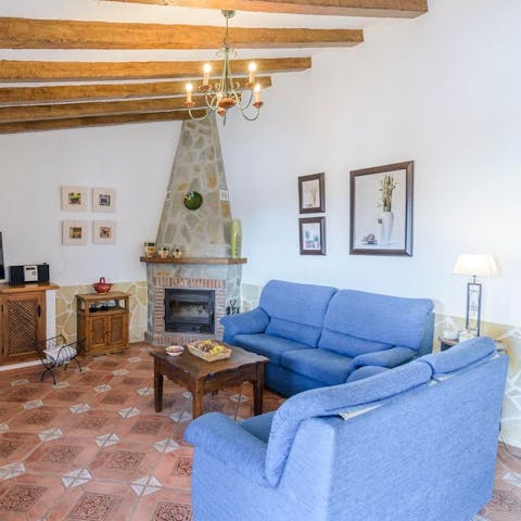 Snuggle up in front of the fire on cooler nights and enjoy a movie