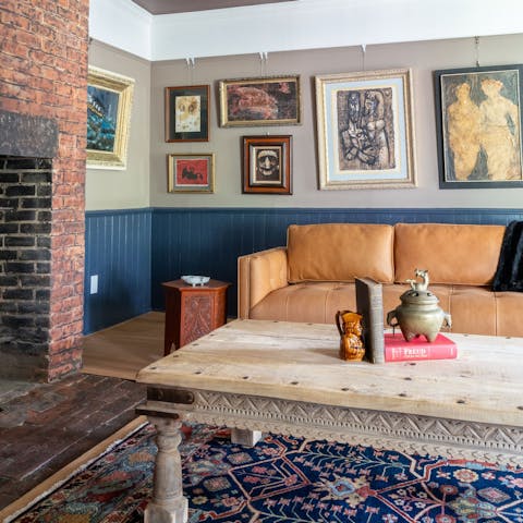 Come home to this historic house with its cosy, art-filled rooms