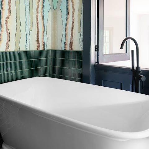Unwind in the roll-top tub – a luxurious way to end the day