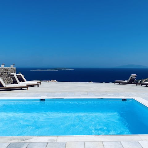 Admire the wonderful Aegean Sea vistas from the pool