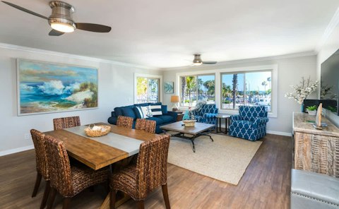 Enjoy framed views of Newport Beach harbour through sun-filled windows