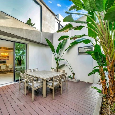 Embrace outdoor living on the palm-fringed terrace