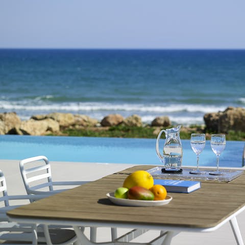 Drink Greek coffee by the infinity pool before exploring Kissamos (2km away)