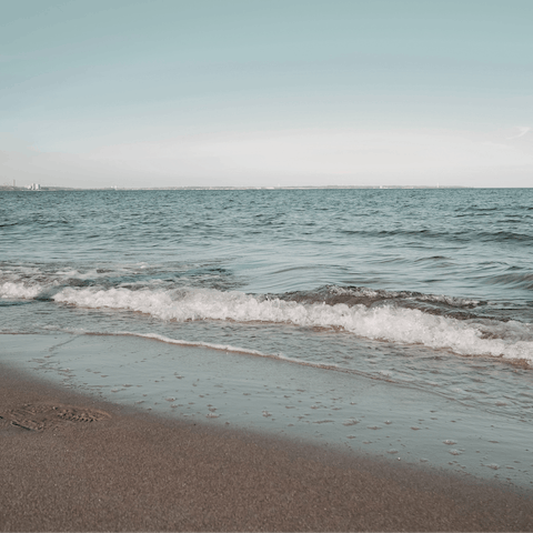 Spend a day on the sand at Stafilos Beach, just 4km away