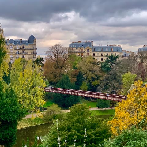 Stroll over to Parc des Buttes-Chaumont in ten minutes 