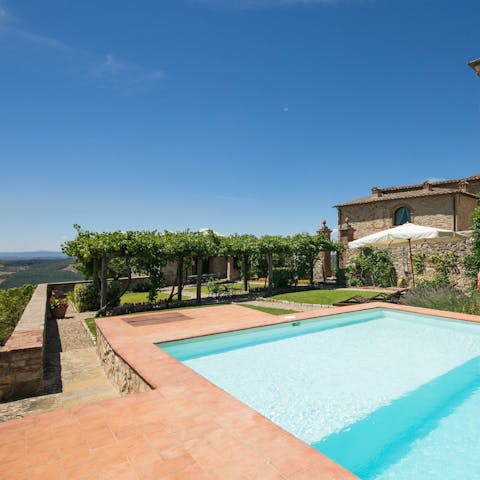 Go for a dip in the private pool with a stunning view of Chianti