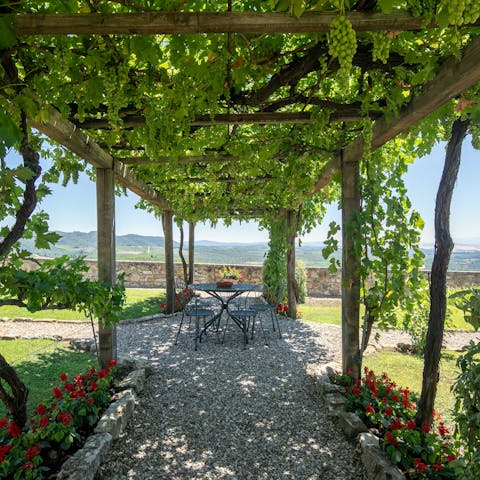 Enjoy alfresco dining in the picturesque fenced garden