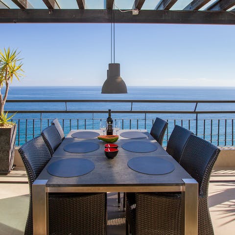 Dine alfresco on the covered terrace as you look out toward the horizon, and enjoy all your meals in the fresh air