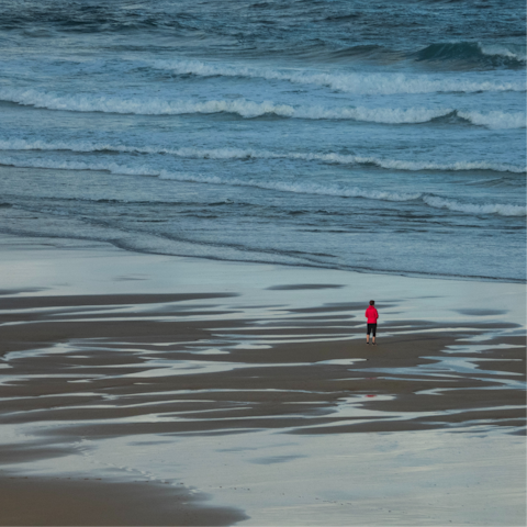 Feel the sand beneath your feet at mighty Watergate Beach, just a short drive away