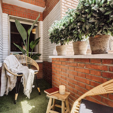Relax with a book and a coffee on the balcony