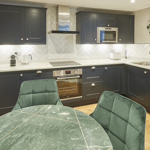 Plate up a fresh seafood dish in the stylish kitchen-dining area