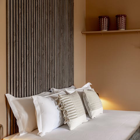 Sink into peaceful sleep after a busy day of shopping and sightseeing