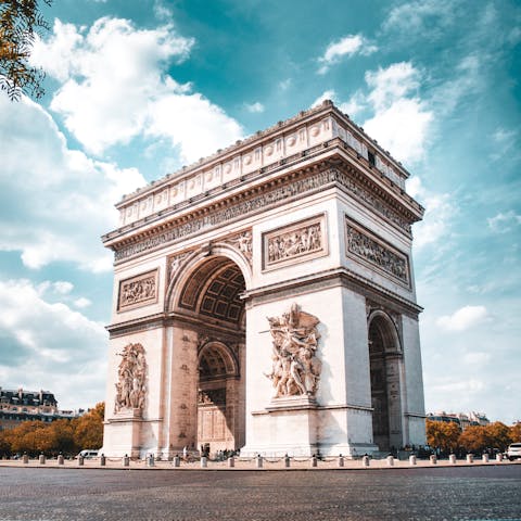 Admire the iconic Arc de Triomphe, an eight-minute walk away