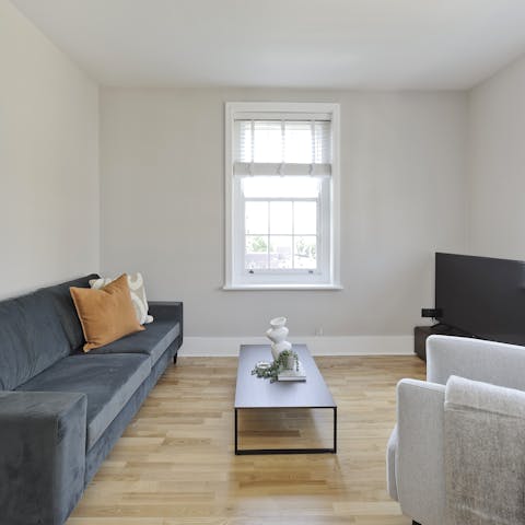 Stretch out on the sofa with a refreshing glass of wine
