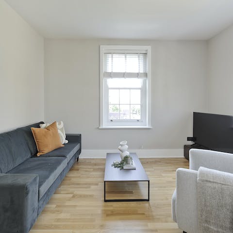 Stretch out on the sofa with a refreshing glass of wine