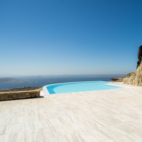 Enjoy spectacular views of the Aegean Sea and Mykonos Town