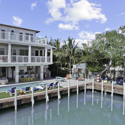 Moor up at the 50-foot dock right outside your home