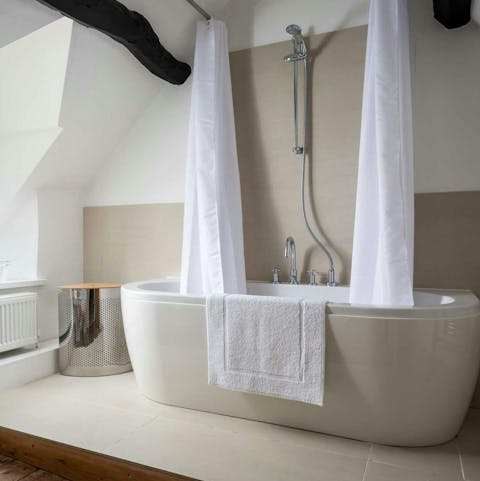 Sink into the bath to unwind after a day exploring the great outdoors