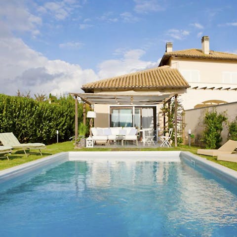 Slip into the pristine pool and cool off from the midday sun
