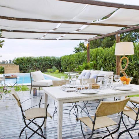 Sit under the shade of the pergola and enjoy lunch outside