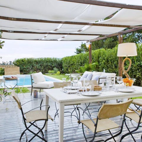 Sit under the shade of the pergola and enjoy lunch outside